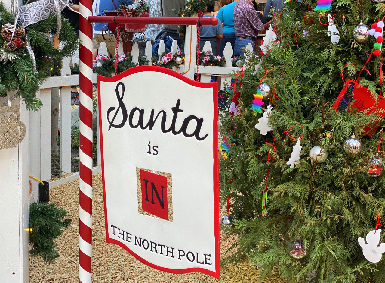 Santa is in The North Pole Sign