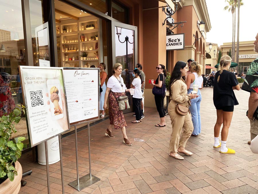 line of people outside Bacio di Latte 