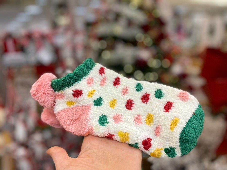 Cozy up with these irresistibly soft and snug fuzzy socks.