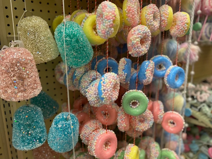 Create a unique atmosphere with the Pink Frosted Donuts Garland from Hobby Lobby. 