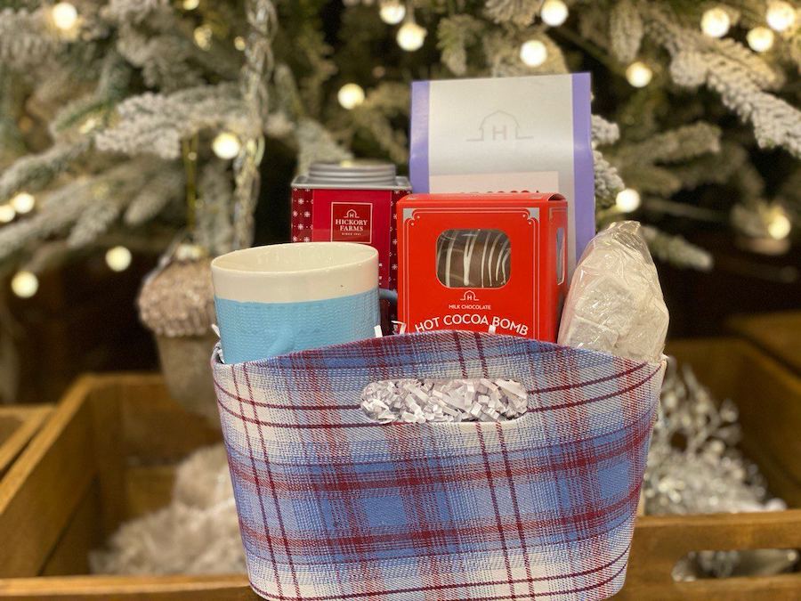 Dive into the cozy embrace of the Hickory Farms Hot Cocoa Gift Basket, a collection that promises warmth and indulgence in every sip.