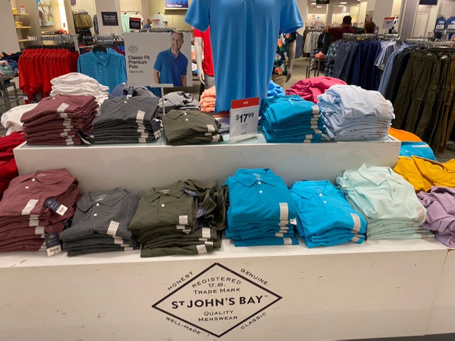Introducing the St. John's Bay Premium Stretch Men's Classic Fit Short Sleeve Polo Shirt – a stylish burst of color that will elevate any man's wardrobe.