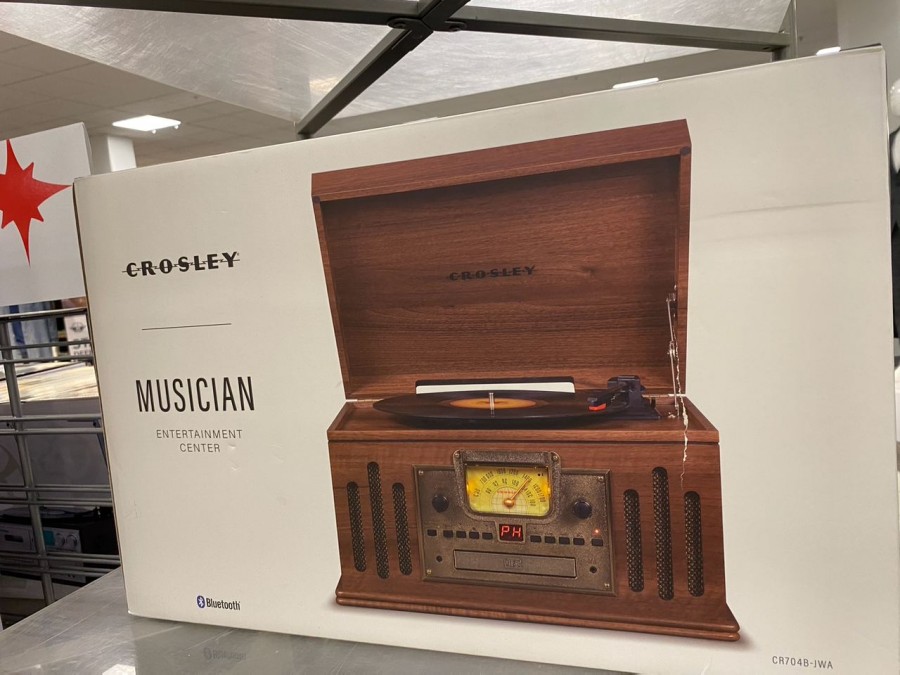 Elevate his passion for tunes with the Crosley Musician Entertainment Center.