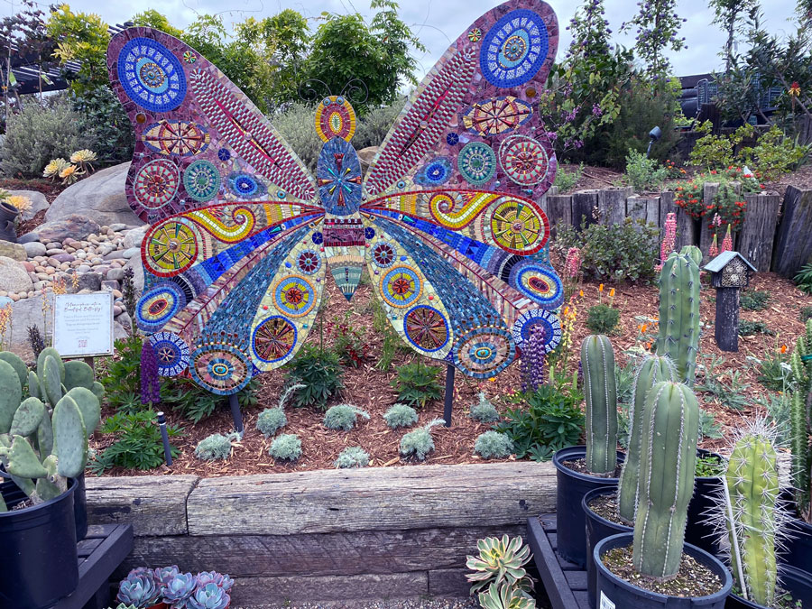 Inspire Wonder in Your Garden: Find Captivating Butterfly Decor at Roger's Gardens!