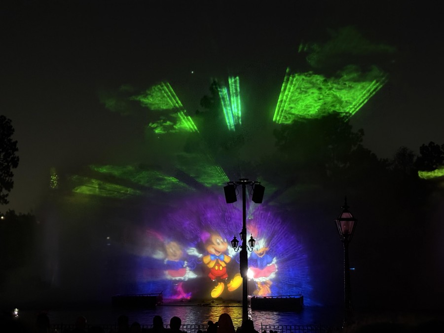 A glowing night at Disneyland captured in the dazzling "World of Color Happiness!" show.