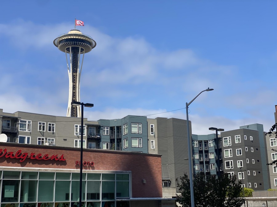 The Space Needle stands tall over Seattle Center, offering 360-degree views from above.