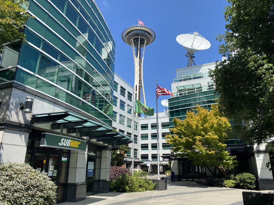 Seattle’s iconic Monorail glides toward the Space Needle, offering a fast and scenic ride from downtown to Seattle Center.