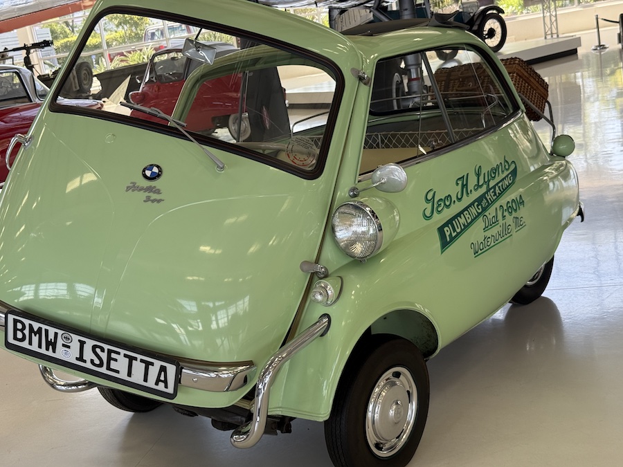 Compact vintage microcar with bubble-like design.