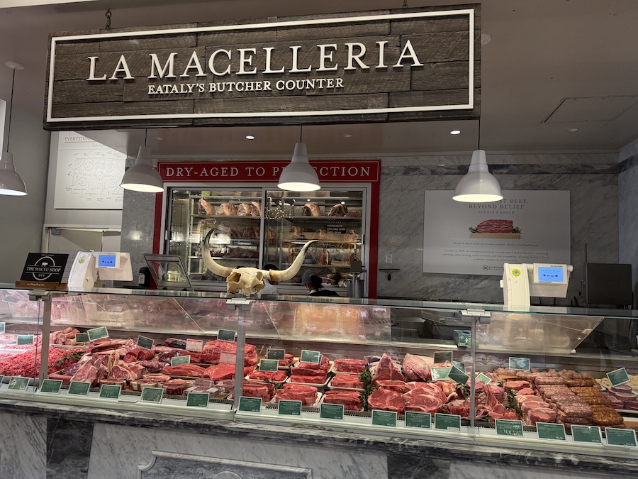 Butcher’s counter at La Magelleria featuring freshly cut premium meats.