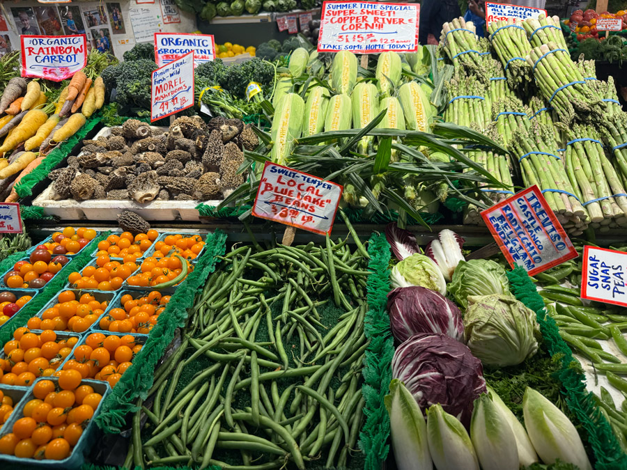 Fresh vegetable stalls at Pike Place Market.