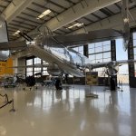 Lyon Air Museum hangar filled with WWII aircraft and vehicles.