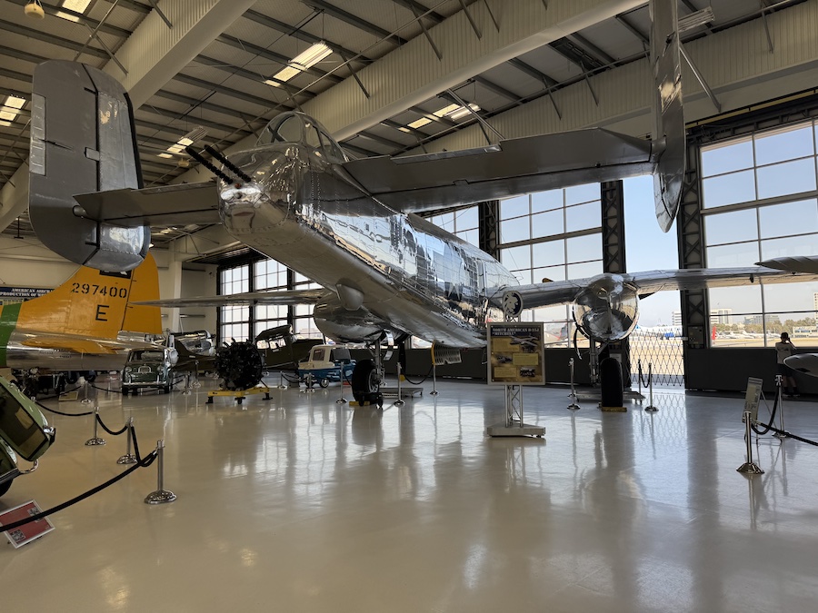 Lyon Air Museum hangar filled with WWII aircraft and vehicles.