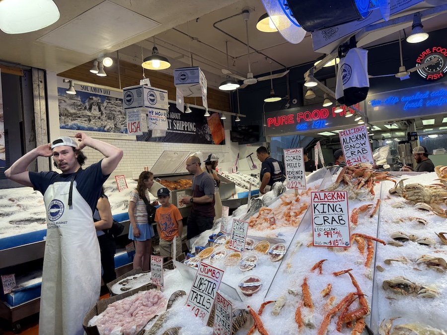 Pure Food Fish Market’s vibrant stall filled with fish, shrimp, and smoked salmon.