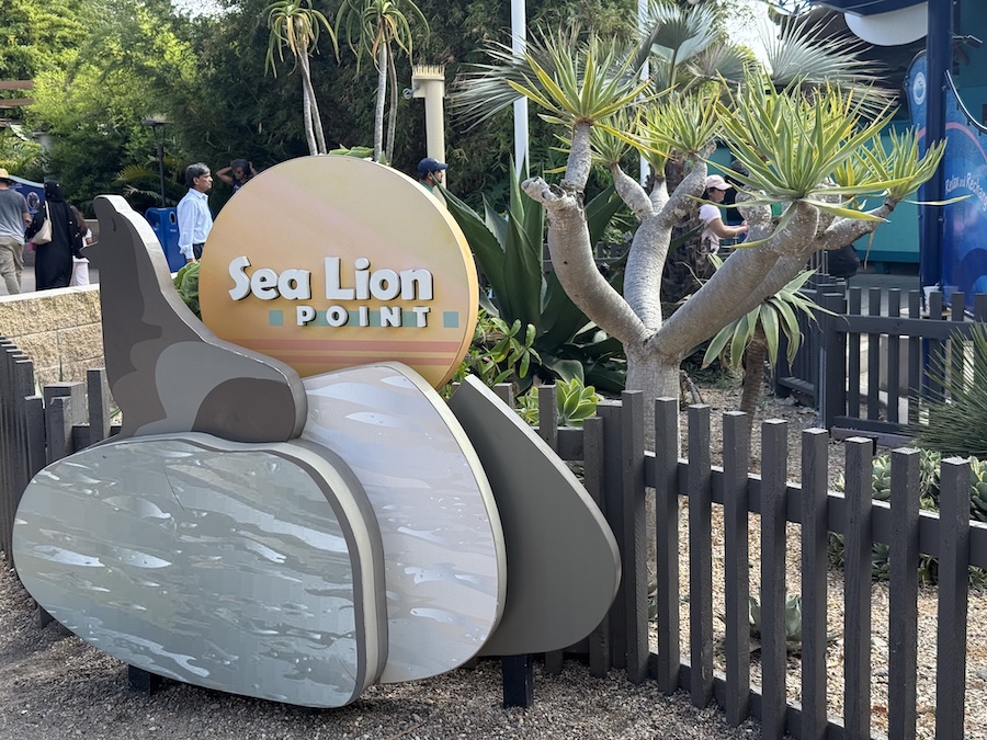 Visitors walk to the Sea Lion exhibit at SeaWorld San Diego.