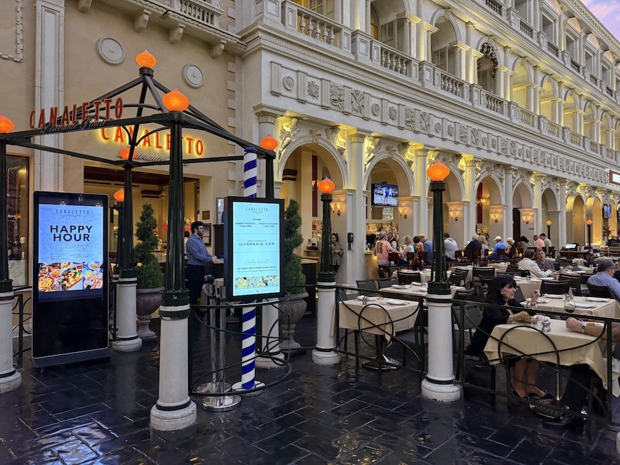 Guests dine under soft lighting at Canaletto, a fine Italian restaurant inside The Venetian.