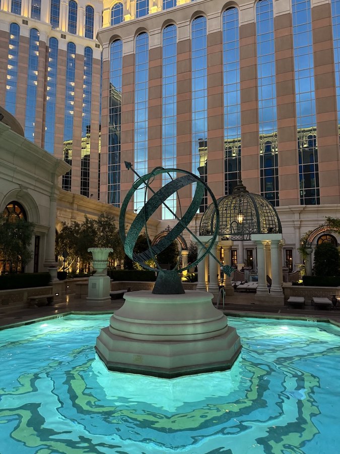 The meticulously landscaped surroundings and classic Italian-inspired architecture create a serene oasis for relaxation and enjoyment.