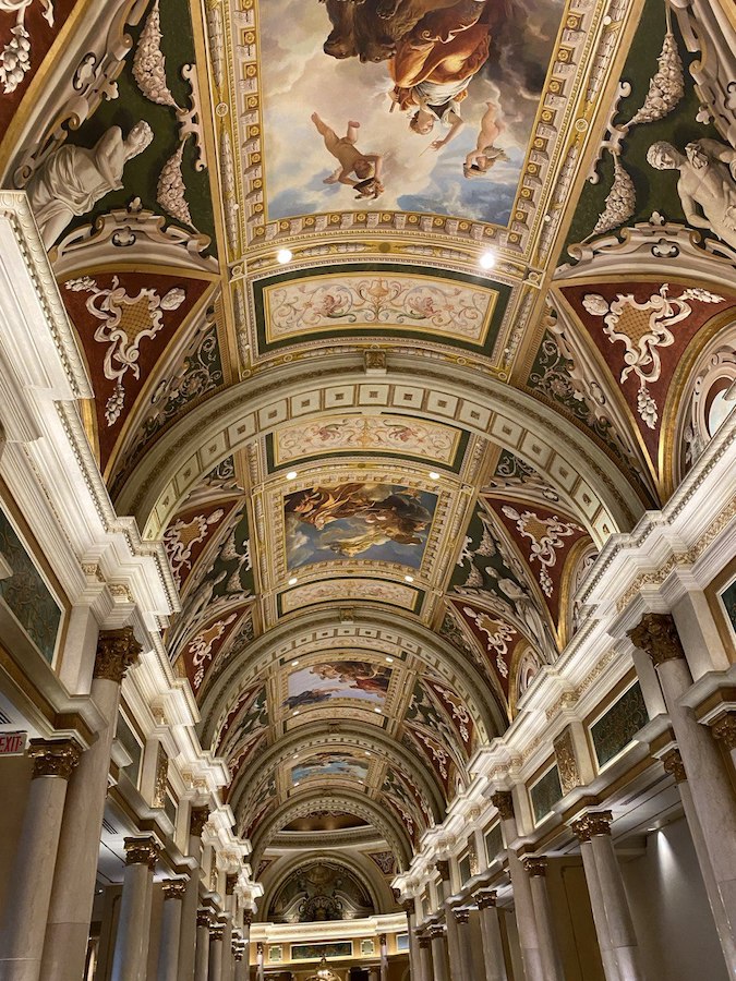 The stunning painted ceiling of The Venetian’s lobby captures the grandeur of Italian Renaissance art.