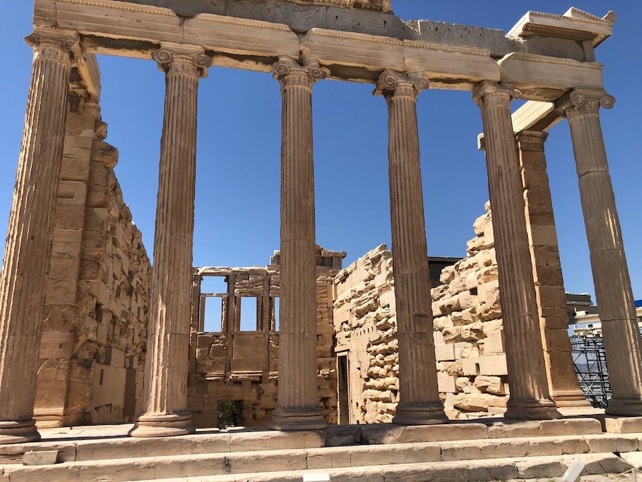 The Parthenon standing tall under the bright blue Athens sky.