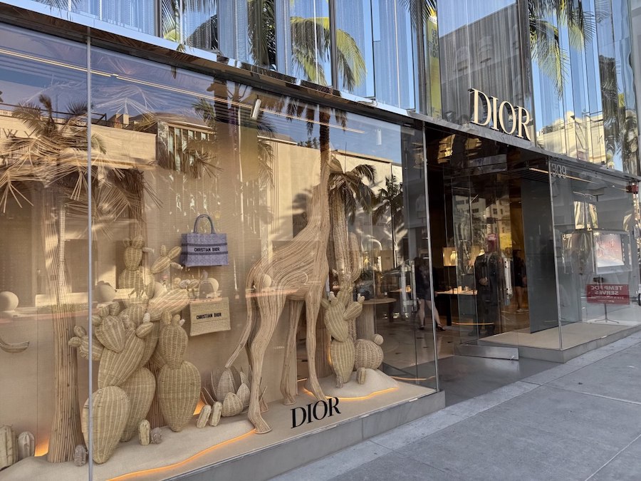 Dior boutique with iconic fashion window displays in Beverly Hills.