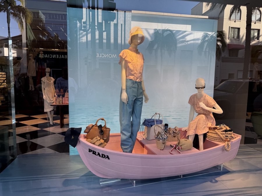 Designer handbags displayed in a Beverly Hills storefront.
