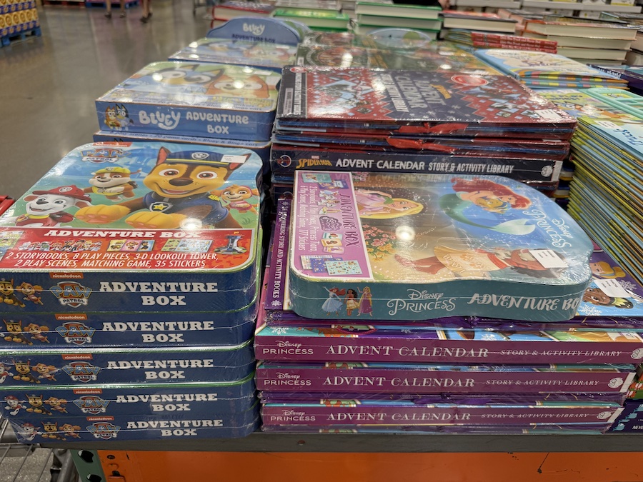 Elegant advent boxes with numbered drawers showcased in Costco’s seasonal section.