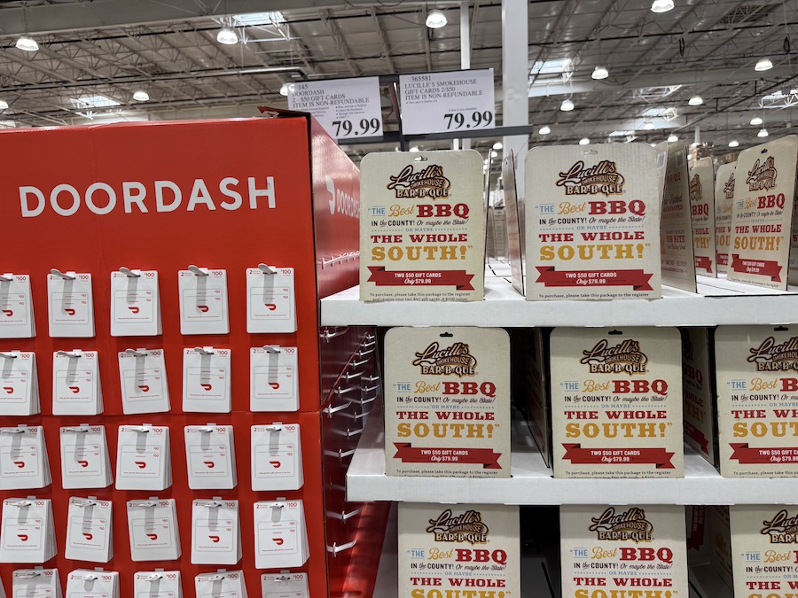 Lucille's Smokehouse BBQ and DoorDash gift cards displayed in Costco’s gift card section.