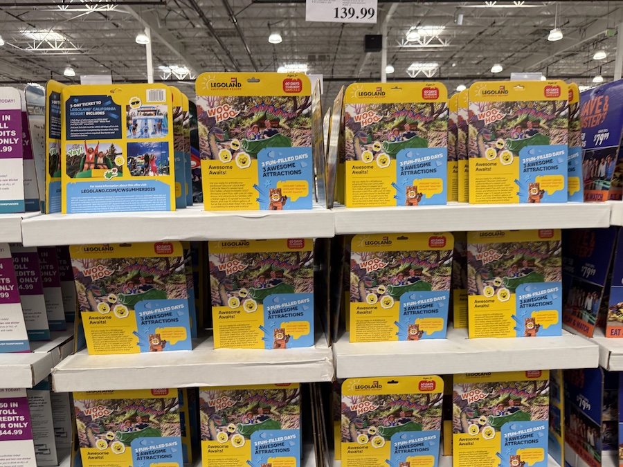 Colorful Legoland gift cards for theme park entry displayed at Costco.