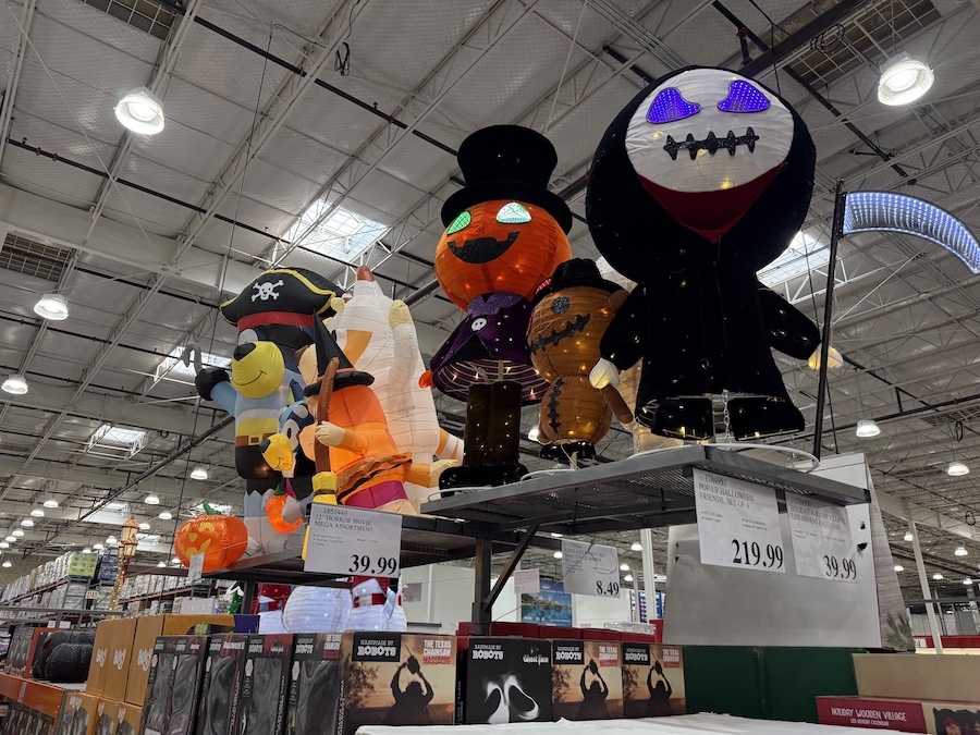 Halloween accessories stacked in Costco’s seasonal section.
