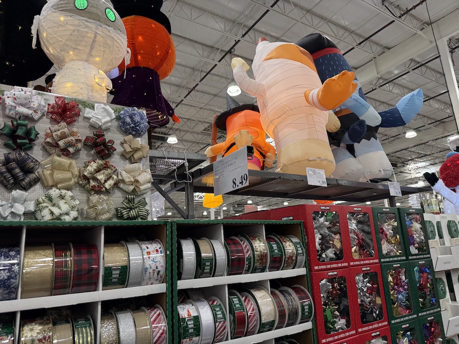 Tables with handicraft kits and supplies for making DIY souvenirs in Costco’s middle section.