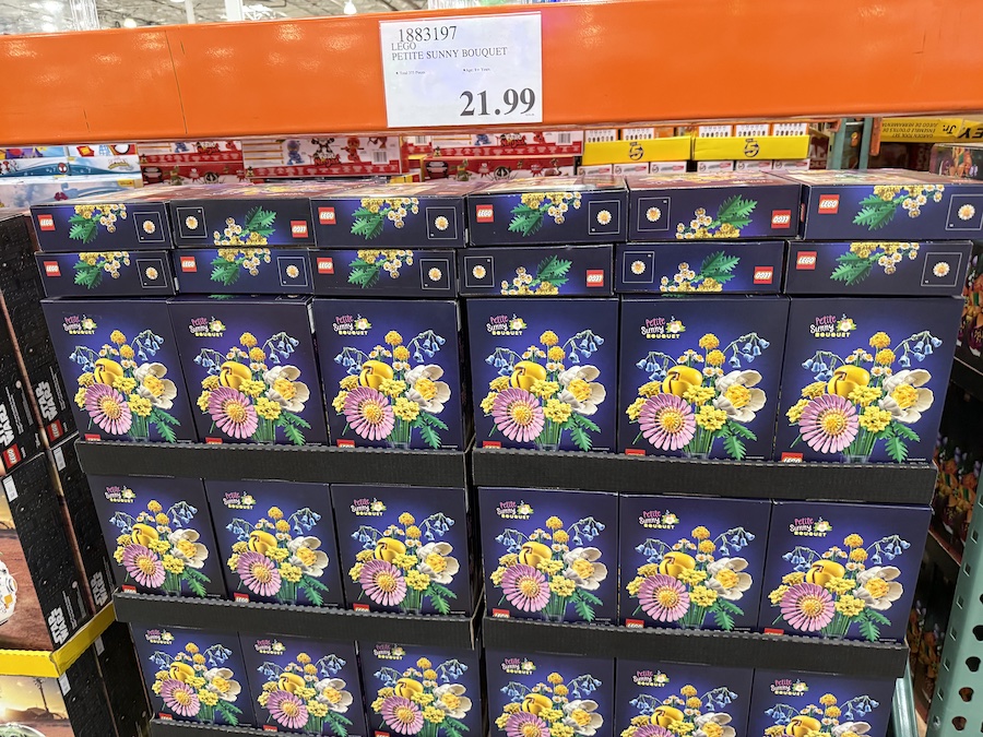 Stacks of LEGO sets arranged in Costco’s middle aisles for holiday shoppers.