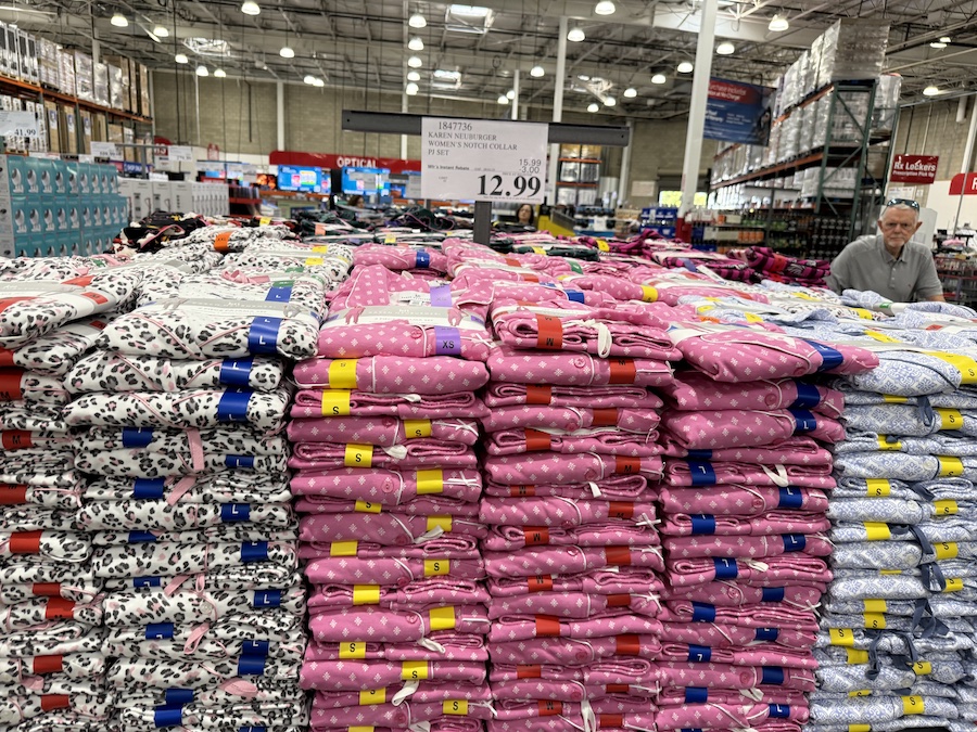 Costco’s middle section filled with clothing tables and seasonal apparel.