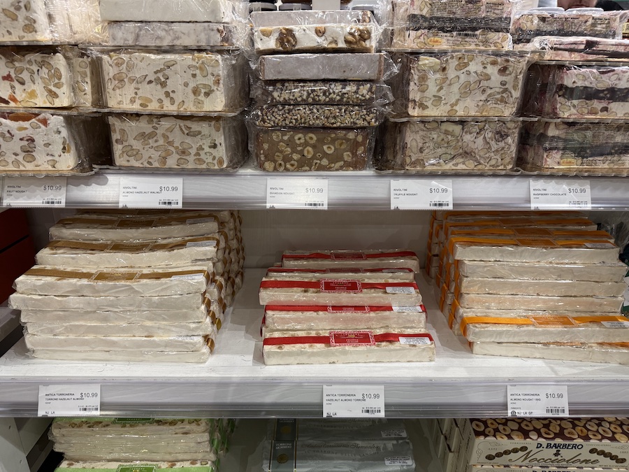 Traditional Italian nougat slices with nuts inside.