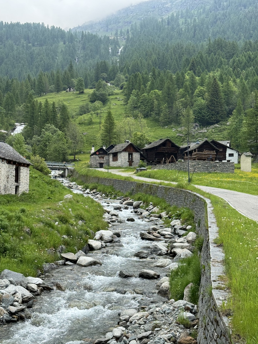 Clear mountain river flowing through the village.