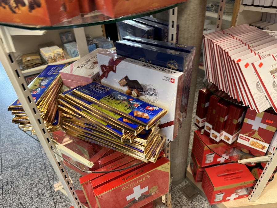 Various sweets on the shelves of the store in assortment.