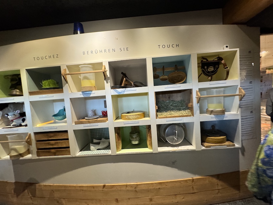 Traditional tools and utensils used in Swiss cheesemaking.