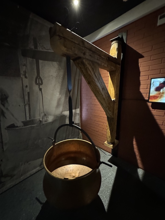 An ancient copper cauldron in which cheese was cooked over a fire.