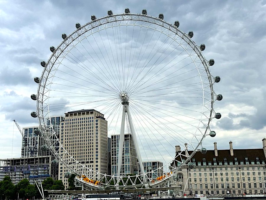 Iconic observation wheel on the River Thames offering panoramic views of London.