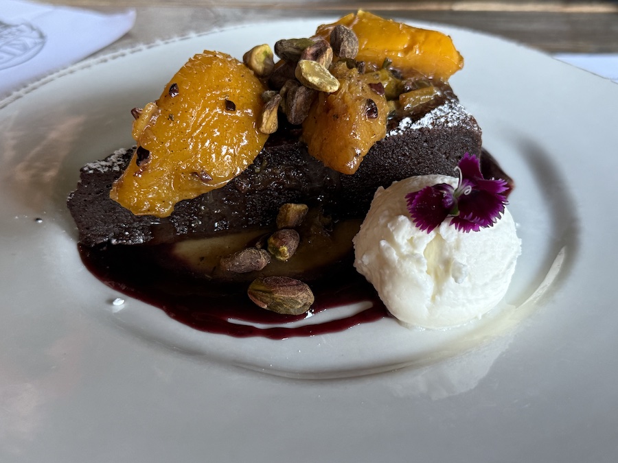 An elegant dessert with ice cream, ready to be served.