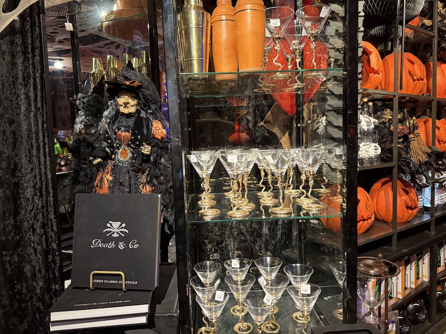 Themed kitchenware with pumpkin and bat motifs.
