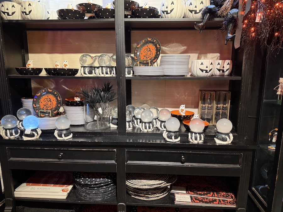 Halloween-themed plates decorated with bats and spiders.