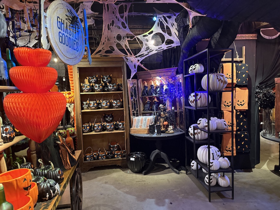 Hanging cobwebs draped across displays.