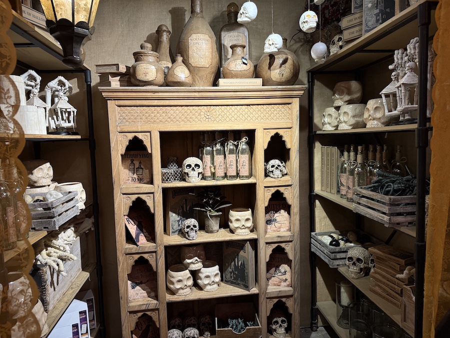 Skulls are laid out on shelves.