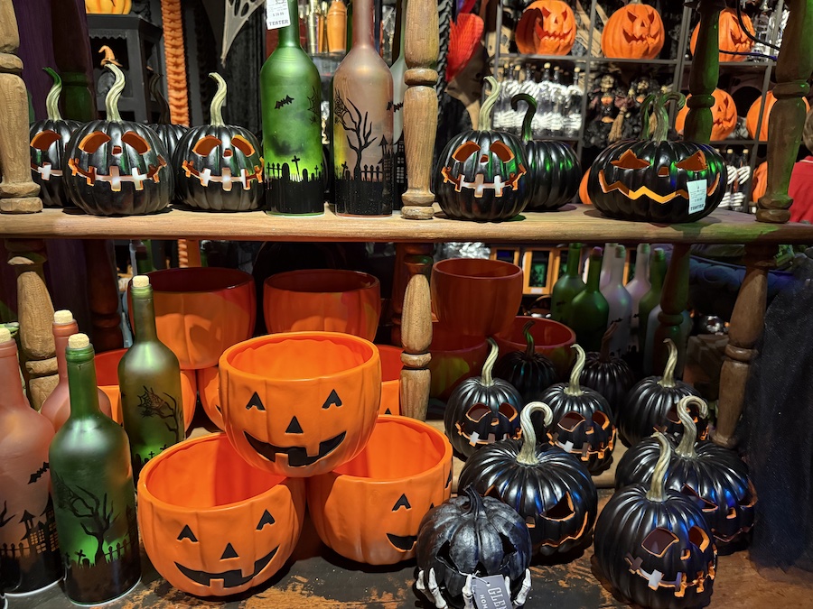 Hand-painted ceramic pumpkins with metallic finishes.
