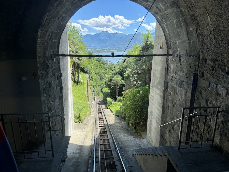 Panoramic view from the funicular tracks overlooking Locarno and the lake.