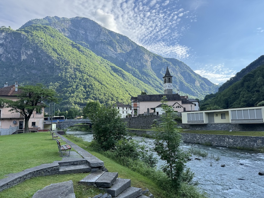 Bell tower rising above a Ticino mountain village.