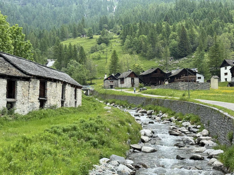A rapid stream through a village in the Alps.