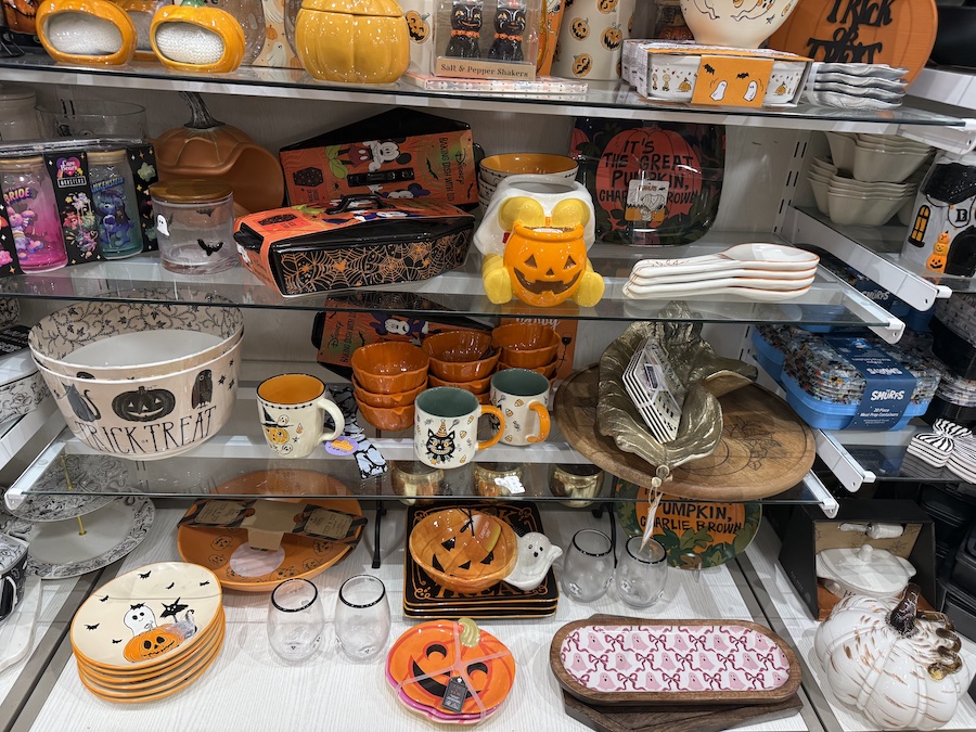 A close-up view of festive cups, mugs, and plates.