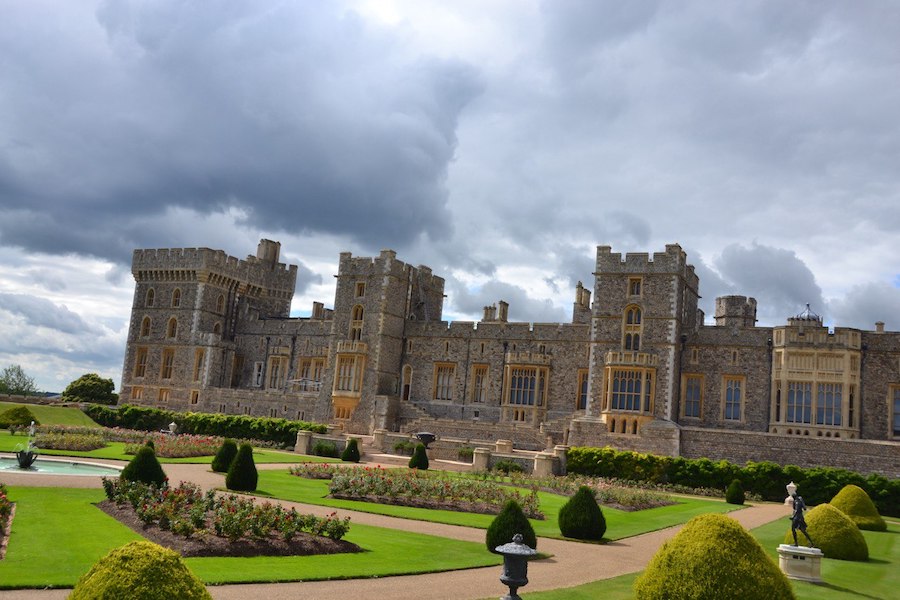 Historic royal residence with towers and gardens in Windsor.