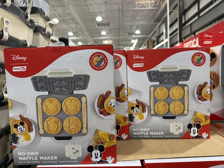 Dash Disney Mickey & Friends No-Drip Waffle Maker in bright red boxes stacked in a fun display.