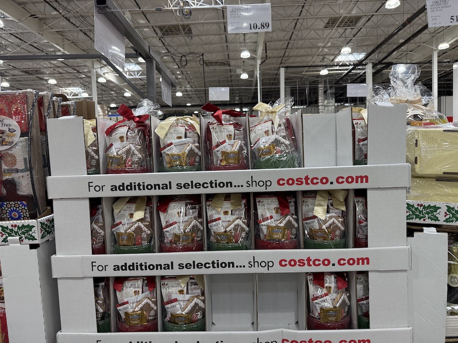 Festive box filled with bite-sized cookies, chocolates, and mini desserts.